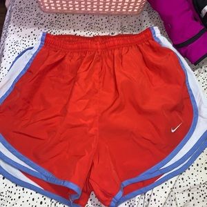 red and blue nike shorts, size small!